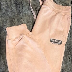 Peloton Blush Pink Sweatpants with 'Stronger Together' Logo